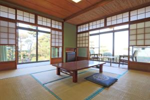 TV a/nebo společenská místnost v ubytování 龍宮館