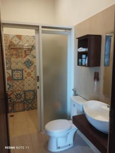 O baie la Villa Ndalem Pendowoharjo Jogja