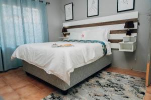 Ένα ή περισσότερα κρεβάτια σε δωμάτιο στο One Apartment