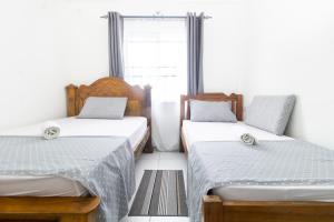 Ένα ή περισσότερα κρεβάτια σε δωμάτιο στο Princevy Homes