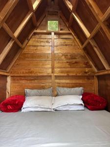 a bed in the attic of a cabin at Campsite Yedikha in Viswema