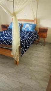 Postel nebo postele na pokoji v ubytování Cosy modern one bedroom apartment