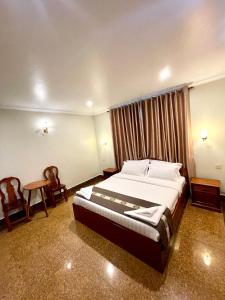 Ένα ή περισσότερα κρεβάτια σε δωμάτιο στο You Mean Heng Guesthouse