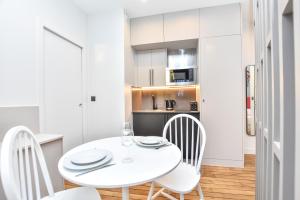 Η κουζίνα ή μικρή κουζίνα στο Magnificent studio - 2P - near the Palais Garnier +6 φωτογραφίες