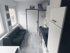 O bucătărie sau chicinetă la Loft - Übernachten im ehemaligen Kinovorführraum