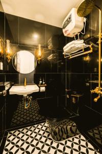 Koupelna v ubytování Vina Vintage Hotel + 73 fotografií