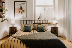 Ένα ή περισσότερα κρεβάτια σε δωμάτιο στο Agata Studio