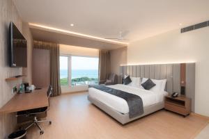 Postel nebo postele na pokoji v ubytování OCEAN PEARL