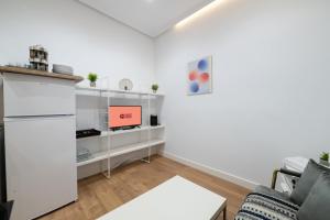 Køkken eller tekøkken på GuestReady- Bright central Madrid Flat + 20 billeder