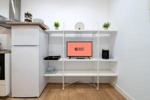Køkken eller tekøkken på GuestReady- Bright central Madrid Flat