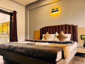 Postel nebo postele na pokoji v ubytování Ragvi Resort Alibaug