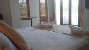 Ένα ή περισσότερα κρεβάτια σε δωμάτιο στο Dreams Hotel