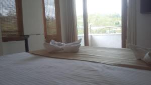 Ένα ή περισσότερα κρεβάτια σε δωμάτιο στο Dreams Hotel