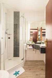 Koupelna v ubytování Hotel Touric