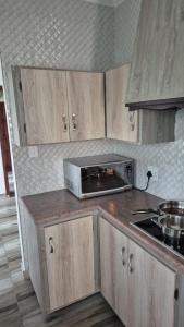 Η κουζίνα ή μικρή κουζίνα στο Halaal On The Vaal