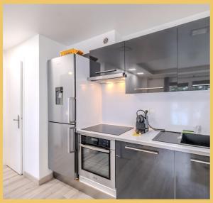 Η κουζίνα ή μικρή κουζίνα στο Chez Pat' I T2 I Saint-Julien