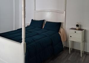 Ένα ή περισσότερα κρεβάτια σε δωμάτιο στο Appartement Atlas Hospitium +5 φωτογραφίες