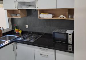 Η κουζίνα ή μικρή κουζίνα στο Appartement Atlas Hospitium