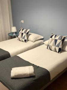 En eller flere senge i et værelse på I Cirmoli