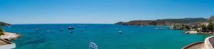 a large body of water with boats in it at Panorama Hotel in Agia Marina Aegina