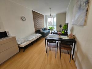 Postel nebo postele na pokoji v ubytování VB City Apartment