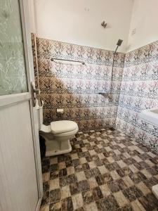 a bathroom with a toilet and a sink at Royal Resort in Weligama +38 photos