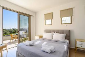 Postel nebo postele na pokoji v ubytování Villa Eva Olivestone by Villa Plus + 17 fotografií