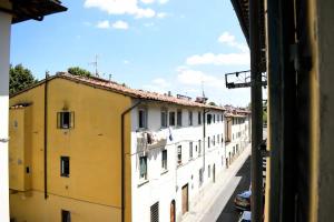 a view from a window of a street with buildings at The Hamilton House in Florence