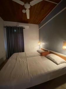 Postel nebo postele na pokoji v ubytování Nimneth Villa + 3 fotografie