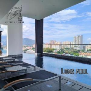 a view of a swimming pool on a building at Urban Suites 2BR #SelfCheck-in #6Pax #TopFacilities in Jelutong