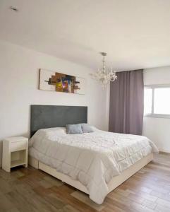 Postel nebo postele na pokoji v ubytování MC Ceibos