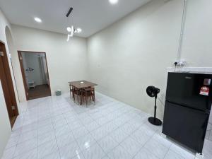 Køkken eller tekøkken på Permaisuri homestay + 8 billeder