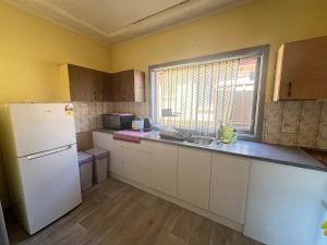 Η κουζίνα ή μικρή κουζίνα στο Queen Room Close to Station and Shops - PH3