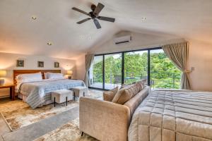 Ένα ή περισσότερα κρεβάτια σε δωμάτιο στο Blue Jungle Lodge +51 φωτογραφίες