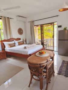Ένα ή περισσότερα κρεβάτια σε δωμάτιο στο Anne Hillside Apartment