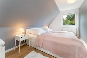 Postel nebo postele na pokoji v ubytování Kleine Pause