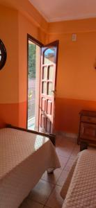 Ένα ή περισσότερα κρεβάτια σε δωμάτιο στο Tierra del Sol