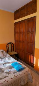 Ένα ή περισσότερα κρεβάτια σε δωμάτιο στο Tierra del Sol