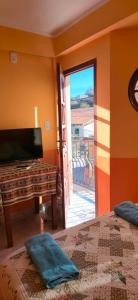 Ένα ή περισσότερα κρεβάτια σε δωμάτιο στο Tierra del Sol +3 φωτογραφίες