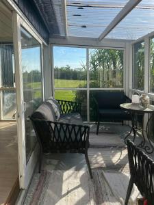 Khu vực ghế ngồi tại Holiday Home With Fjord Views At Horsens Fjord +13 ảnh