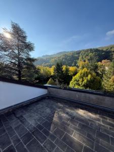 a balcony with a view of a mountain at Castelvetri B&B in Castiglione dei Pepoli