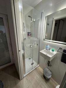 a bathroom with a shower and a sink at Casita Playa Yolanda in Santa Pola