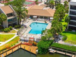 an aerial view of a pool at a resort at Book Me Baby! Bayview Beauty at Siesta Key in Siesta Key
