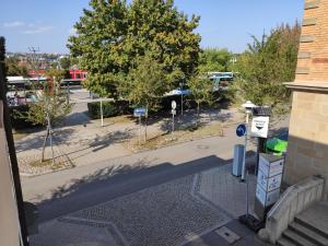 an overhead view of a street with a tree at Unterkunft am Bahnhof Herrenberg in Herrenberg