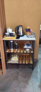 a small table with food on top of it at Depto alem in Leandro N. Alem