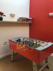 a table with avertisement for at Sladen Lodge in Hathersage