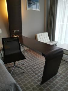 TV a/nebo společenská místnost v ubytování Hotel Marine Apartament prywatny