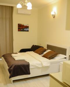 Postel nebo postele na pokoji v ubytování Sea&city Batumi