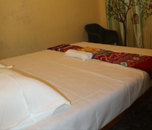 Ένα ή περισσότερα κρεβάτια σε δωμάτιο στο Kudle Heaven +1 φωτογραφίες