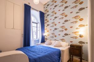 Giường trong phòng chung tại Mareluna Promenade - Seafront Apartments +80 ảnh